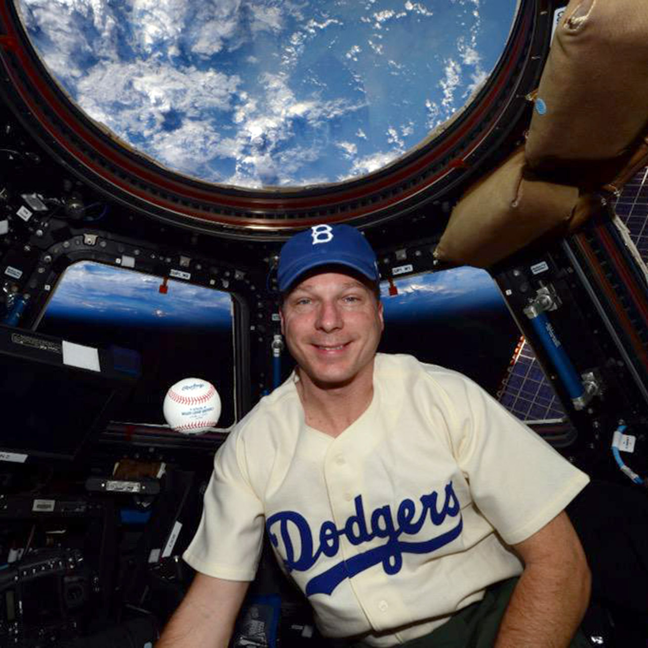 Astronaut Terry Virts wears Jackie Robinson's Brooklyn Dodgers uniform in space
