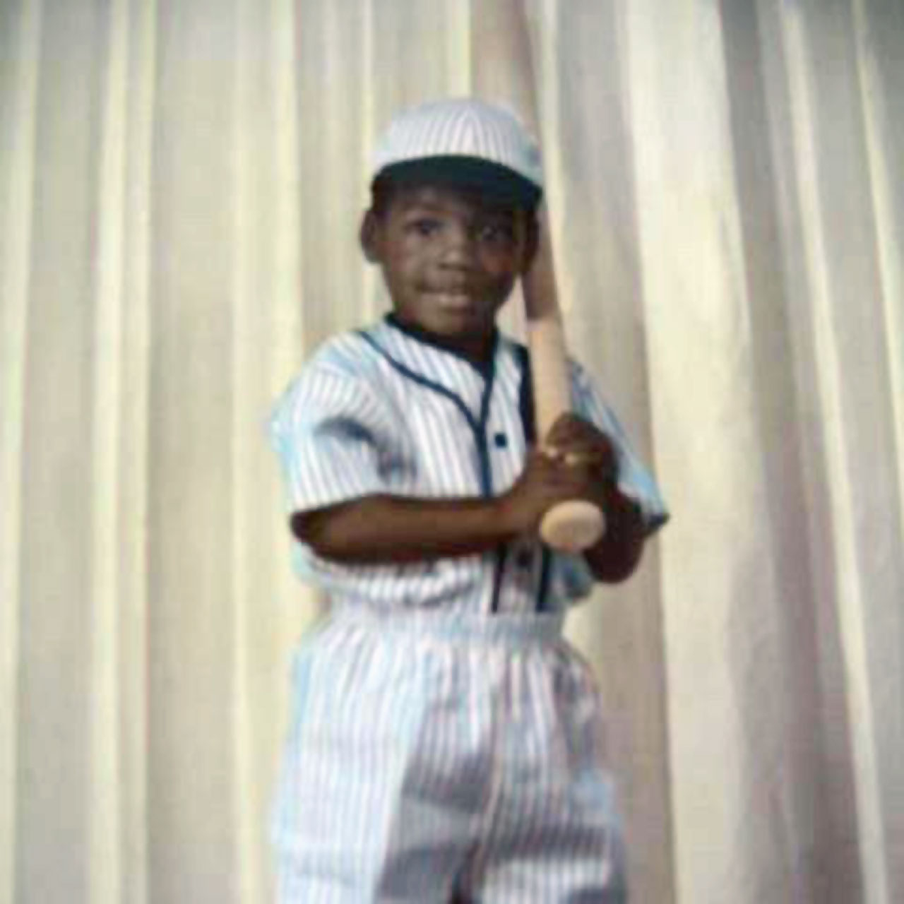 Barry Bonds in his first baseball uniform