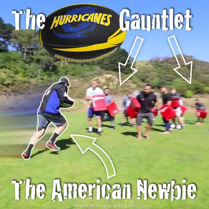 Elton Castee of TFIL runs the gauntlet formed by Wellington Hurricanes rugby players