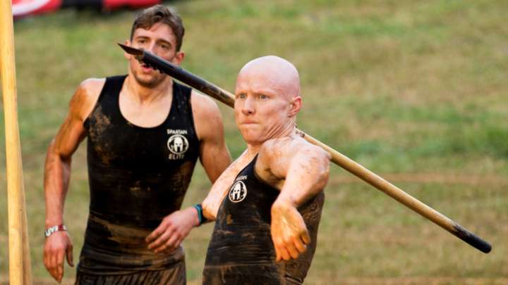 Ninja warrior Kevin Bull tosses a spear on NBC's 'Spartan: Ultimate Team Challenge'