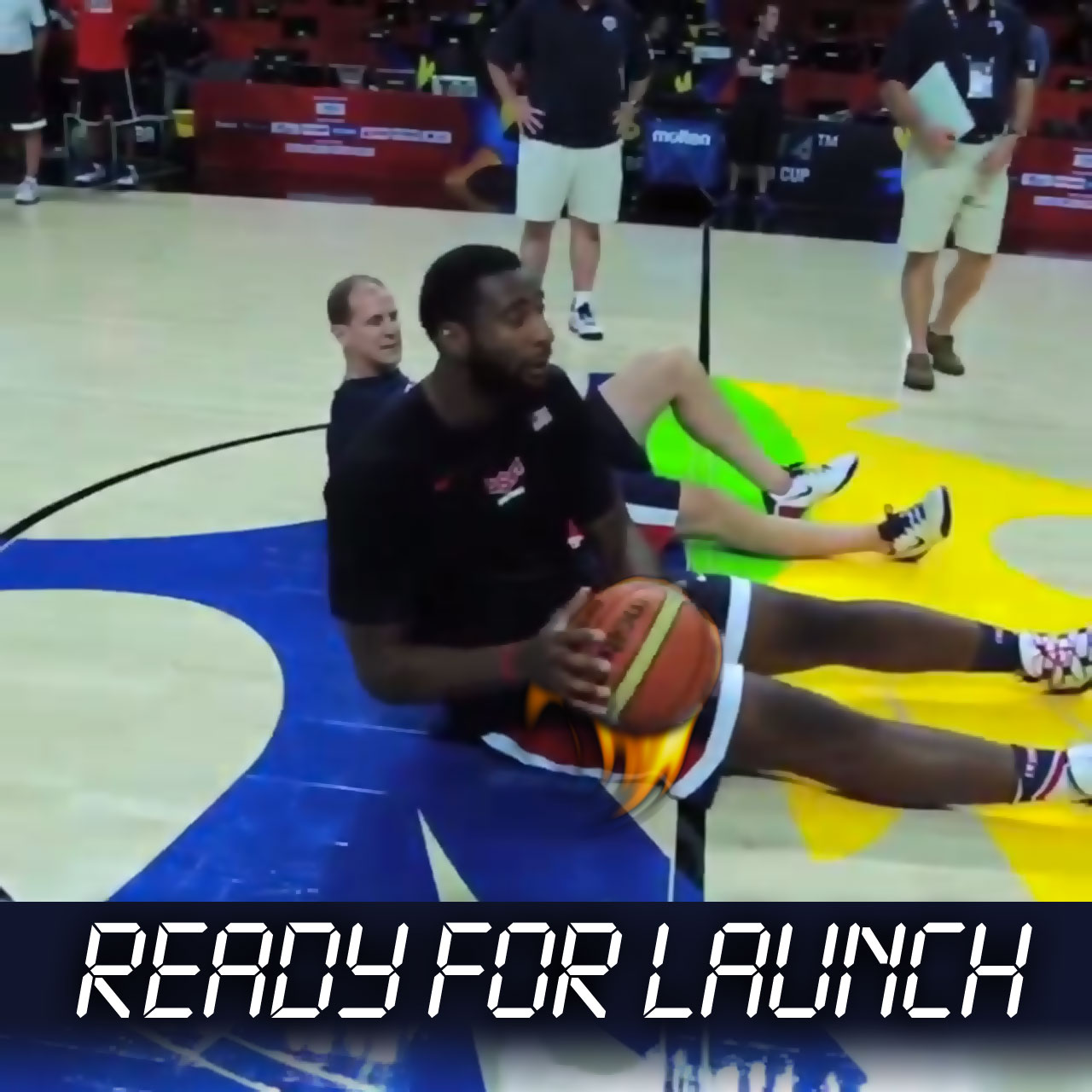 Pistons center Andre Drummond prepares to launch seated half court shot