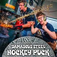 Blacksmith Alec Steele and his American guest forge a Damascus steel hockey puck