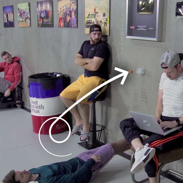 Dude Perfect goes sideways for water bottle flip trick optical illusion