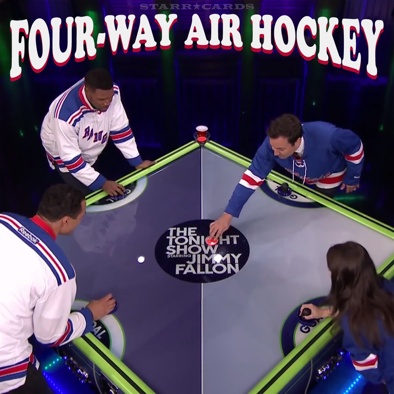 Jimmy Fallon, Eve Hewson, Michael Strahan and Tony Gonzalez play four-way air hockey