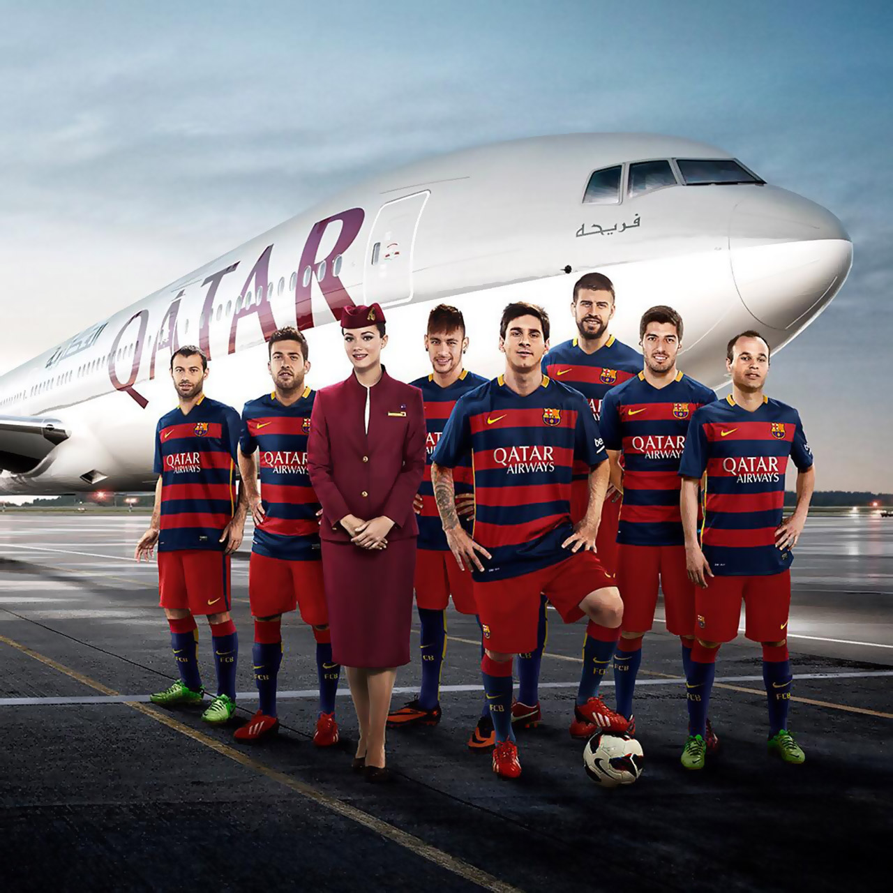 Lionel Messi and FC Barcelona players pose with Qatar Airways jet