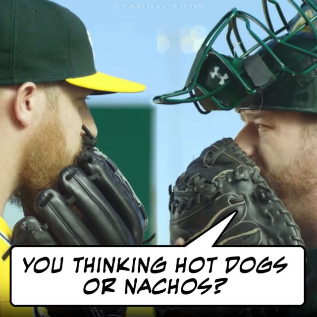 Oakland Athletics catcher Stephen Vogt and Pitcher Sean Doolittle consult on the mound