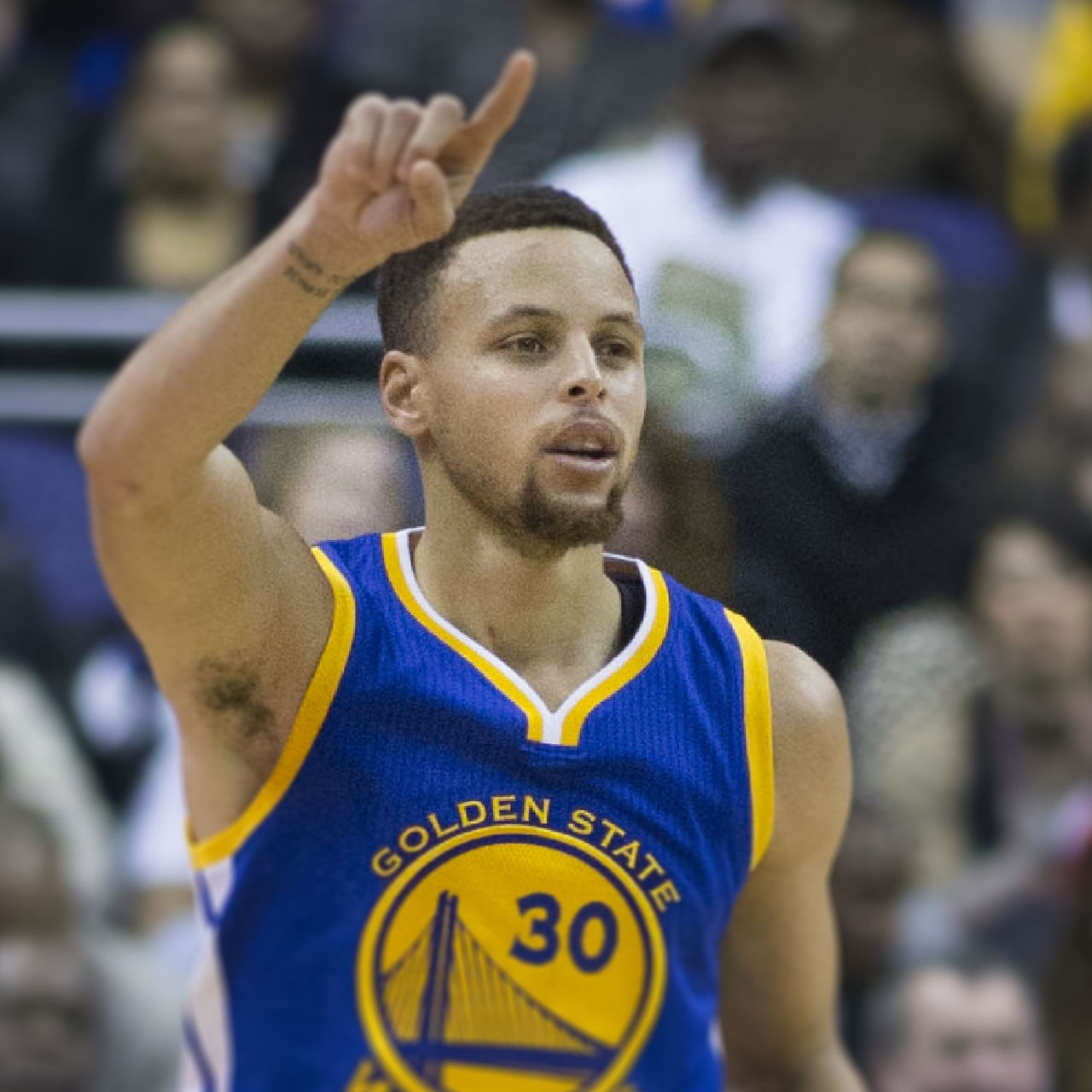 Warriors Steph Curry dribbles ball up court
