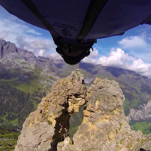 Wingsuit flyer Uli Emanuele flies through 2-meter cave