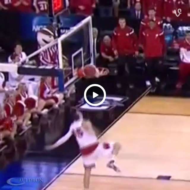 Wisconsin Badgers small forward Sam Dekker puts ball through hoop twice on dunk